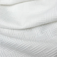 Tissu matelassé jacquard tricoté haut de gamme toutes saisons, tissu texturé polyvalent pour vêtements matelassés pour femmes et hommes toute l'année