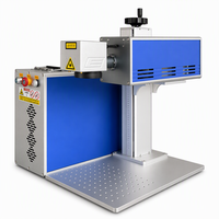 Machine de marquage au laser CO2 RF pour le bois, l'acrylique, le papier, le MDF, le caoutchouc, le cuir, petite taille, idéale pour les espaces restreints avec une faible empreinte au sol.
