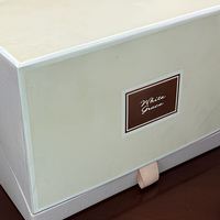 Boîte cadeau de luxe personnalisée avec ruban à tirette et logo estampé à chaud en or rose