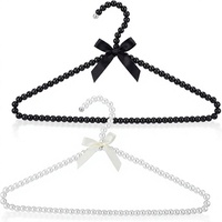 Cintre élégant en plastique ABS léger anti-rouille avec crochet en laiton pour robe de mariée et manteau