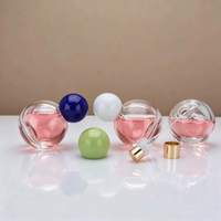 Flacon de parfum luxueux et élégant, personnalisation en gros, bouteilles en verre transparent haut de gamme, bouchons à bille bleus, diffuseur à bâtonnets avec décalcomanie