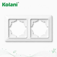 Cadre de finition pour prise double Kolani, norme européenne 120x84mm, ignifuge, en PC, à fixation par encliquetage, double découpe