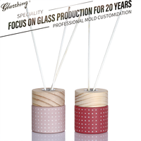 Bouteilles diffuseurs à roseaux en verre rose clair imprimées sur mesure en usine, de 50 ml à 300 ml, écologiques et durables, couleurs et logos personnalisés disponibles