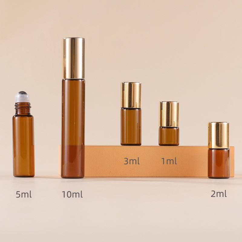 ขวดสีเหลืองอำพัน + ลูกกลิ้งเหล็ก + ฝาอลูมิเนียมสีทอง