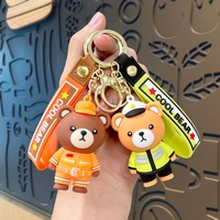 Nouveau design porte-clés en PVC imitation ours, pendentif souple en PVC ours pompier ou policier, breloques animaux 3D en PVC pour décoration