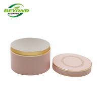 Récipient en papier personnalisé avec logo d'estampage en or emballage cylindrique tube en papier de boîte ronde cosmétique pour bouteille de crème pour le visage