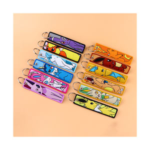 Großhandel klassische japanische Comic-Tasche Monster Stickerei gewebte Jet Tags Ring <span class=keywords><strong>Anime</strong></span> Lanyard Stoff Schlüssel bund Schlüssel anhänger - Product Image 1
