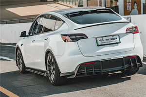 ชุดแต่ง Tesla Model Y สไตล์ Miw คาร์บอนไฟเบอร์ ประกอบด้วยลิ้นหน้า สเกิร์ตข้าง ดิฟฟิวเซอร์ และสปอยเลอร์ - Product Image 4