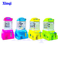 Ventes directes d'usine Machine de jeu à pièces de haute qualité Petite poupée Grab Clip Machine Tank Doll Game Mini Claw Machine