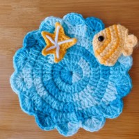 Set de table au crochet en coton bleu dégradé, motifs étoile de mer et poissons tropicaux, idéal pour les paniers de pique-nique et comme cadeau d'anniversaire