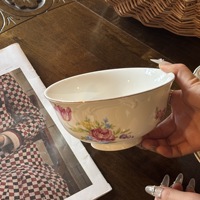 Nouvelle assiette ovale en céramique gaufrée à motif floral, style sud-ouest français, résistante au micro-ondes, pour desserts et présentation.