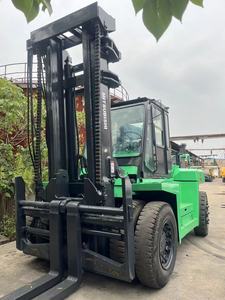 Montacargas Diésel Usado de 15 Toneladas, Tracción 4x4, Modelo FD150, Mástil de Dos Etapas, Neumáticos para Terreno Accidentado, Cabina Verde - Product Image 5