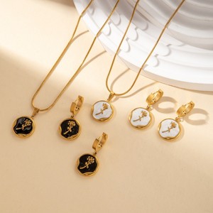 Elegantes Vergoldetes Edelstahl Schwarz-Weiß Emaille Sonne Mond Rose Halskette und Ohrringe Set für Damen - Product Image 1