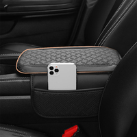 Coussin d'accoudoir de voiture en cuir perforé pour longs trajets, coussin de console centrale avec poche pour téléphone, soulagement de la fatigue, pour BMW Toyota Honda