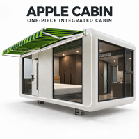 Maisonnette préfabriquée intégrée en une seule pièce, type Apple Cabin, avec verrière panoramique et auvent rétractable pour complexe hôtelier ou camping