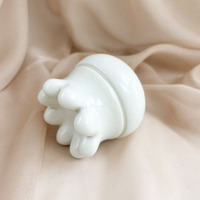 Forme de méduse de masseur de main de matière première en céramique pour le dispositif facial de Guasha d'eau chaude et froide