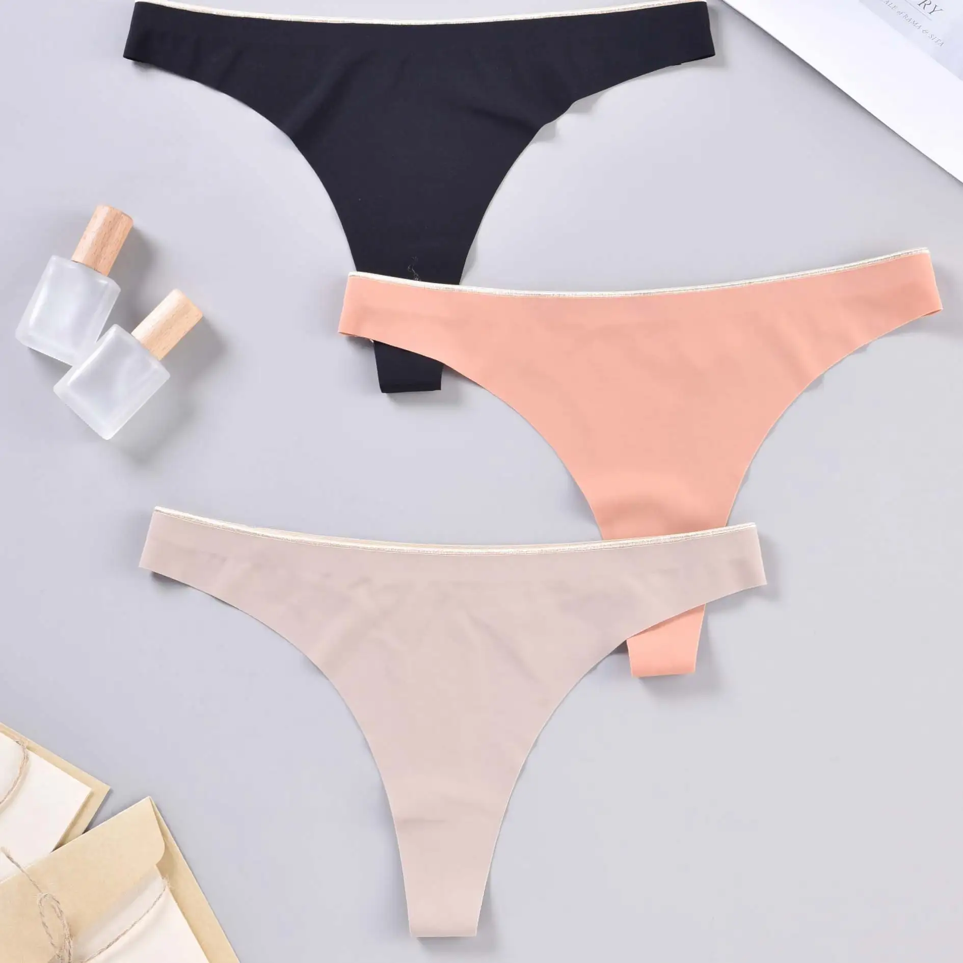 YHYT femmes culottes Sexy tongs sans couture slips couleur unie Lingerie lisse caleçon doux intimes glace soie G-string sous-vêtements