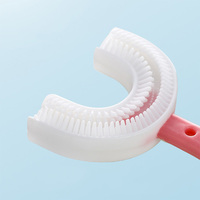 Brosse à dents pour bébé Tête de brosse en silicone en forme de U Nettoyage des dents pour enfants de 2 à 12 ans