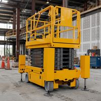 Plateforme élévatrice à ciseaux électrique sur chenilles en acier de 14 m GS1212TL, capacité 450 kg, avec extension de 900 mm pour la construction industrielle