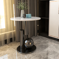 Table d'angle de luxe nordique contemporaine et simple avec plateau rond en pierre frittée et base en acier inoxydable pour salon de villa et d'hôtel