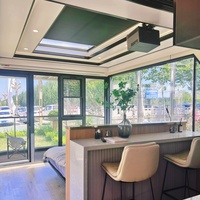 Maison préfabriquée capsule spatiale à commande vocale IA, panneaux sandwich, maisons modulaires modernes pour usage en villa, logement intelligent et écoénergétique