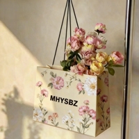 Sacs en papier de luxe personnalisables avec longue poignée pour le shopping, sacs cadeaux cosmétiques sur mesure avec votre propre logo