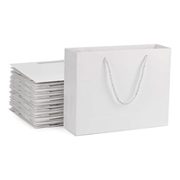 Emballage de magasin de marque compétitive en gros artisanat shopping cadeau de vêtements 35*13*26 sacs en papier blanc de bonne qualité