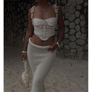ZHEZHE 2025 moda estiva da <span class=keywords><strong>donna</strong></span> 2 pezzi Set senza maniche canotta con cinturino di perle e gonna corta in maglia da spiaggia da <span class=keywords><strong>donna</strong></span> <span class=keywords><strong>Boutique</strong></span> - Product Image 1