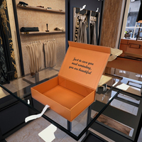 Vente en gros de boîte cadeau magnétique de luxe haut de gamme emballage de vêtement pliable avec logo personnalisé et ruban