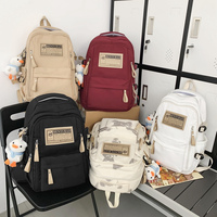 Sac à dos de voyage classique, durable, imperméable, couleur unie, grande capacité, sac à dos personnalisé pour le lycée