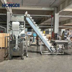 Machine d'emballage automatique à 4 têtes avec peseuse linéaire et élévateur à godets pour le dosage des graines de tournesol et des noix - Product Image 6