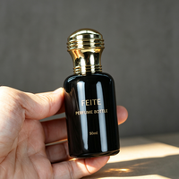 Flacon de parfum en verre noir cylindrique vide de 50 ml, emballage personnalisé avec bouchon doré