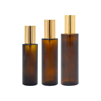 Bouchon noir Anti-UV flacon en verre ambré parfum huile essentielle bouchon en aluminium vaporisateur bouteille ronde longue et fine avec pompe à Lotion