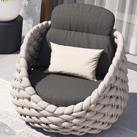 Ensemble de jardin trois pièces transfrontalier en rotin avec structure en acier, canapé et chaise en corde, design minimaliste moderne et écologique pour extérieur et cour