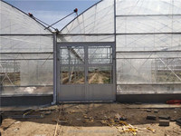Projet clé en main de grande serre de film plastique d'arche à travée multiple pour la plantation de tomates PE durable pour la production de cultures agricoles