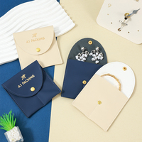 Pochette à bijoux Becan Snap Flap en PU pour bracelets et boucles d'oreilles, emballage cadeau en crème et bleu marine avec logo personnalisé