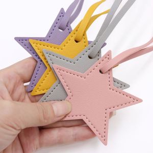 Pendentif de bagage en cuir PU en stock, porte-clés polyvalent étoile à cinq branches pour femmes et filles, accessoire de sac tendance - Product Image 2
