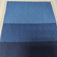 Fornitore della fabbrica 65% cotone 35% poliestere tessuto elasticizzato per abbigliamento in Denim elasticizzato per abbigliamento