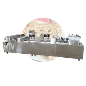 Dos cuchillas de corte, máquina formadora de barras de cereales de caramelo de maní, línea de producción de barras de granola crujientes de sésamo - Product Image 1
