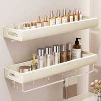 Étagère murale de salle de bain multifonctionnelle moderne JIAYI en acier au carbone, sans perçage, en forme d'arc, pour shampoing et lait corporel