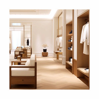 Armoire et présentoir de vêtements pour femmes de magasin spécialisé moderne avec présentoir personnalisable