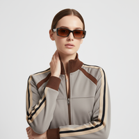 Ensemble de survêtement rétro 2 pièces pour femme : veste zippée à col montant et pantalon de jogging évasé à rayures latérales – Vente en gros