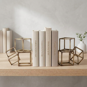 AK Brass Tricube Metal Bookends Set of 2 Brass Finish Decorative Book Holders for Desk Decor Shelf Home Office Decor - Product Image 1