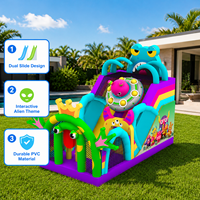 Structure gonflable commerciale à thème monstre avec toboggan et espace de jeu pour enfants, idéale pour la location événementielle