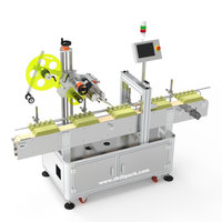 Machine d'étiquetage adhésive pour boîte/plateau à œufs automatique SKILT |   Applicateur d'étiquettes pour cartons de 6/12/30 œufs avec convoyeur