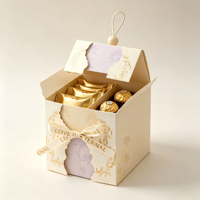 Boîte d'emballage de bonbons en papier avec poignée et nœud papillon