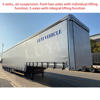 Semi-remorque à rideaux latéraux ouvrants 5 essieux haute capacité de charge 40 pieds en tissu PVC pour transport multimodal et alimentaire