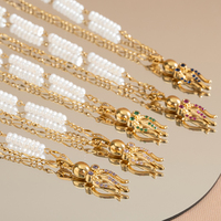 Collier tendance en acier inoxydable pour femme avec pendentif pieuvre 3D et demi-perle d'eau douce sur chaîne Figaro dorée – Vente en gros