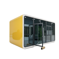 Maison conteneur modulaire en acier pliable moderne, type Apple Cabin, utilisable comme hôtel, entrepôt, bureau ou logement.