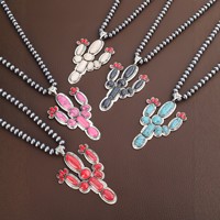 Longue chaîne de perles Navajo avec pendentif cactus surdimensionné vintage incrusté de turquoise